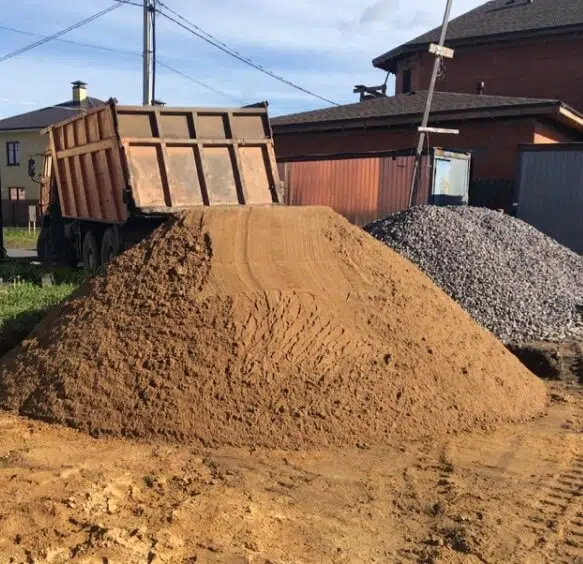 Отсыпка и поднятие участка