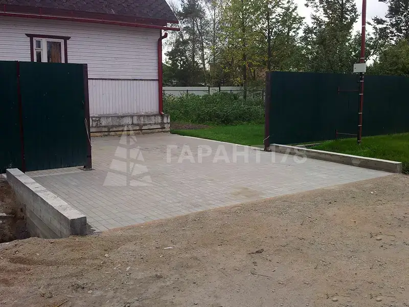 заказать бетонный въезд на участок с трубой и откосами