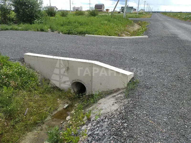заказать щебневый заезд на участок с бетонными откосами и трубой