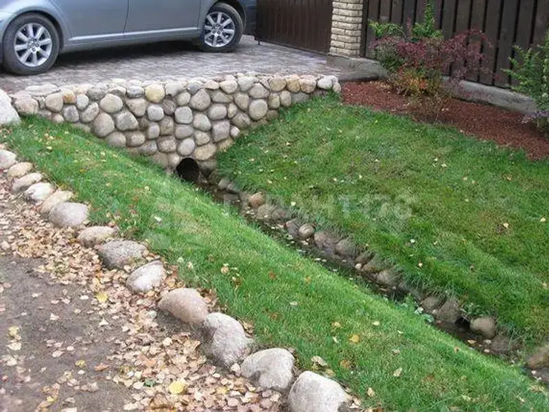 заказать заезд на участок с трубой откосами и облицовкой камнем